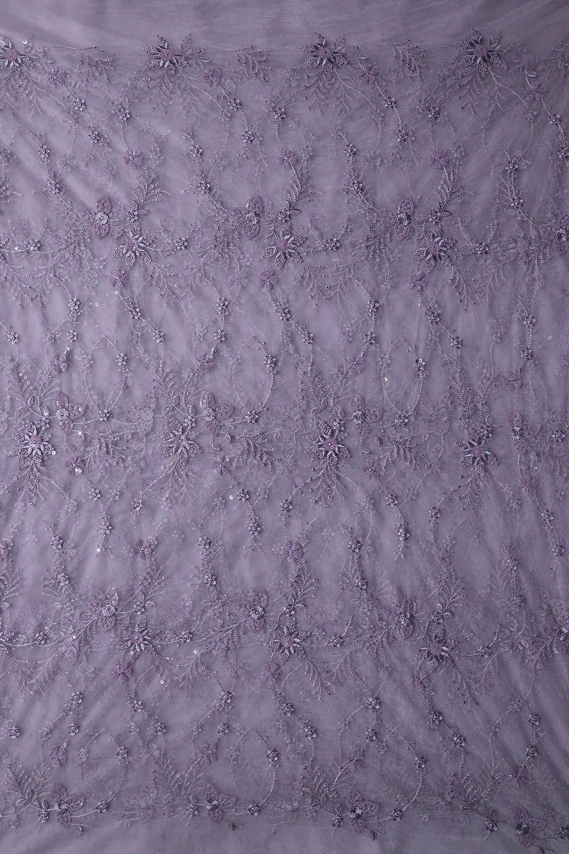 Beautiful Grey Thread With Sequins Floral Embroidery Work On Purple Grey Soft Net Fabric