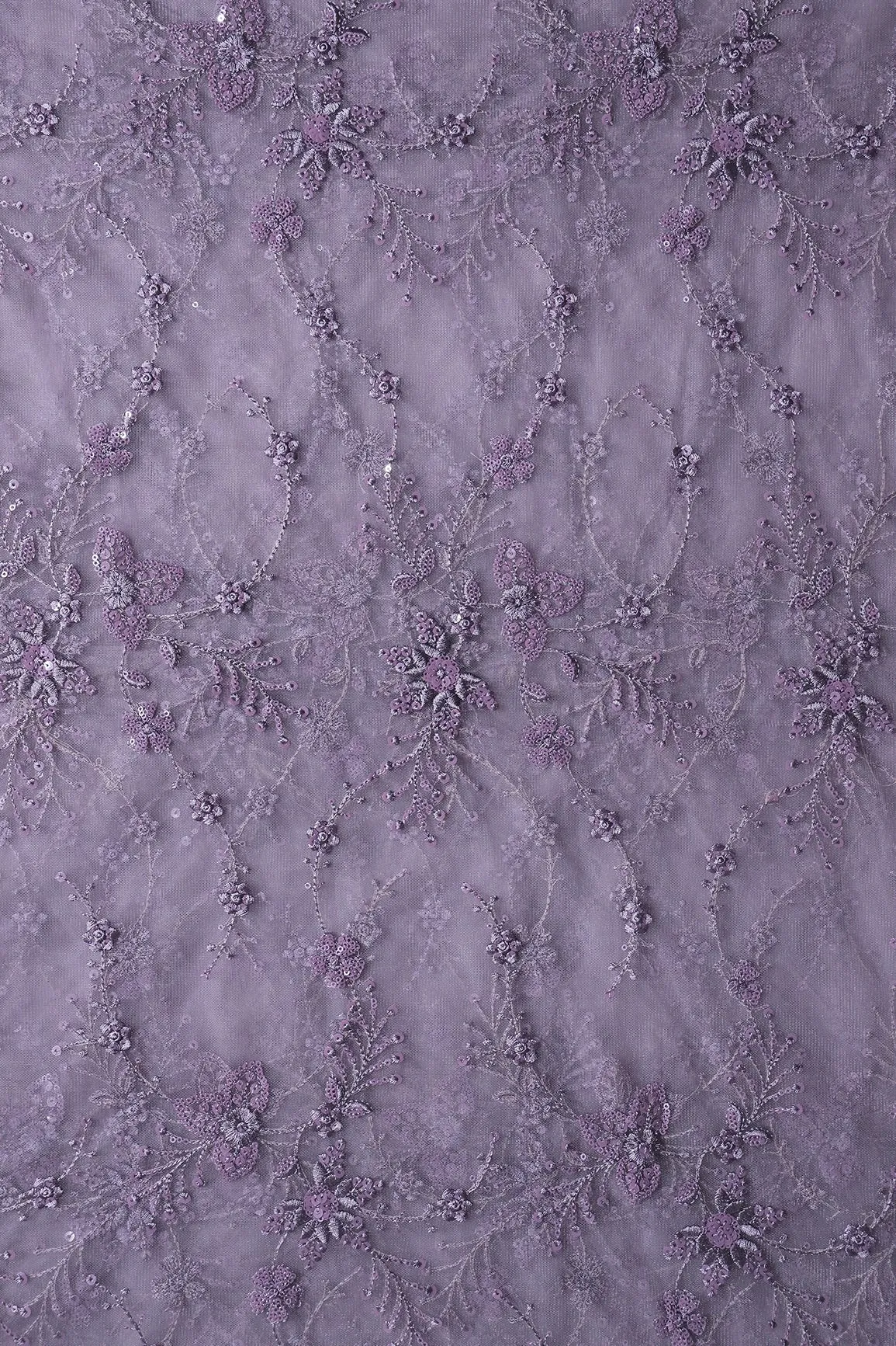 Beautiful Grey Thread With Sequins Floral Embroidery Work On Purple Grey Soft Net Fabric